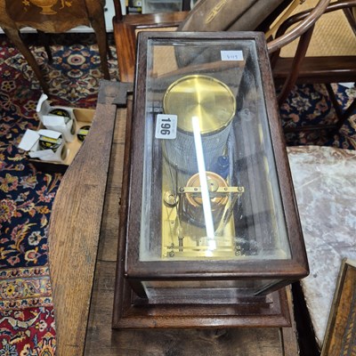 Lot 196 - A barograph in a bevelled glazed mahogany case...