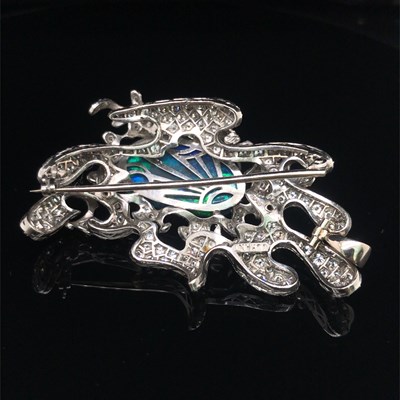 Lot 81 - A boulder opal and diamond pendant brooch....