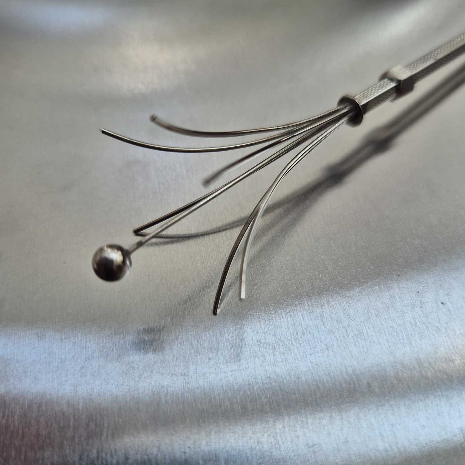 Lot 83 - A vintage swizzle stick stamped sterling...