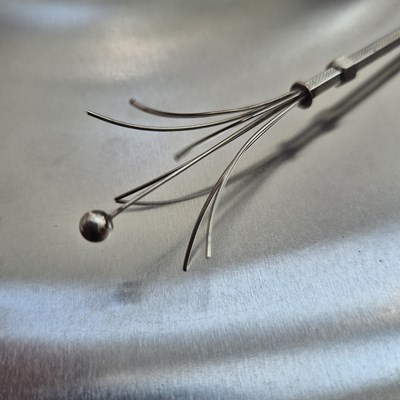 Lot 83 - A vintage swizzle stick stamped sterling...