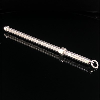 Lot 83 - A vintage swizzle stick stamped sterling...