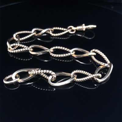 Lot 95 - A 9ct hallmarked gold fancy link bracelet....