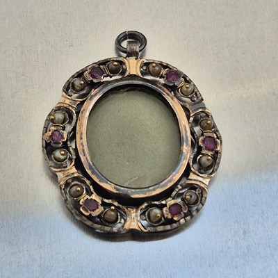 Lot 97 - An antique mourning pendant, with a glazed...