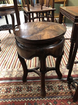 Lot 159 - A Chinese hardwood stool.