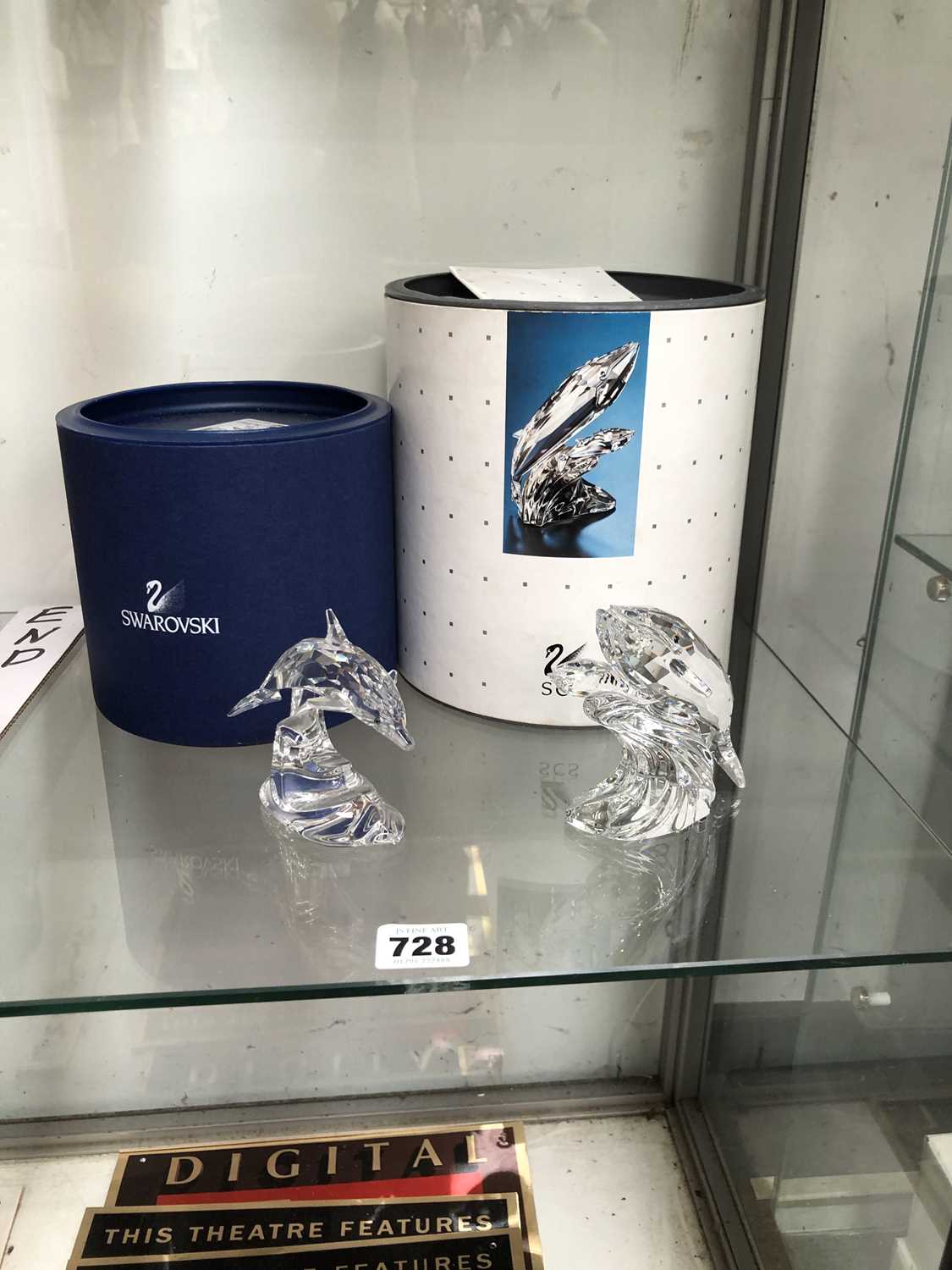 Lot 728 - A boxed Swarovski dolphin figure and a boxed...