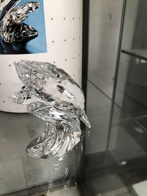 Lot 728 - A boxed Swarovski dolphin figure and a boxed...