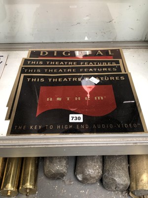 Lot 730 - Four black ground audio-visual advertising panels