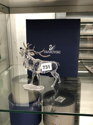 Lot 731 - A boxed Swarovski figure of a bellowing stag
