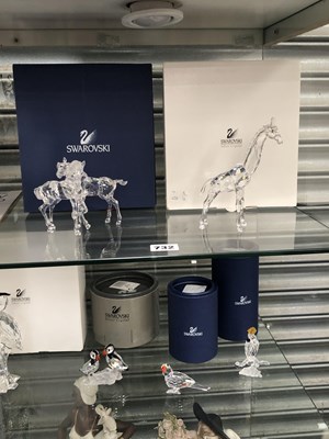 Lot 732 - A boxed pair of Swarovski foals together with...
