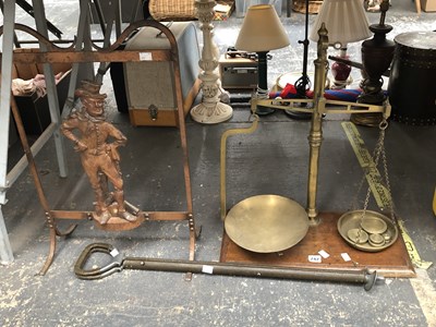 Lot 742 - A brass balance scale with weights, a...