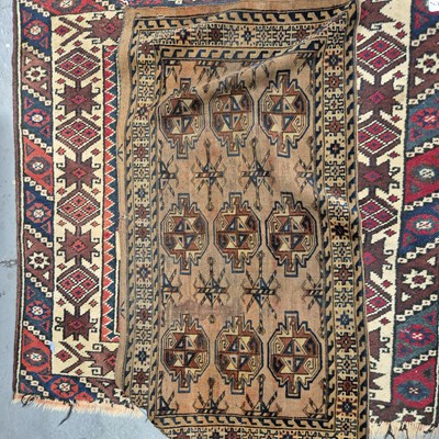 Lot 682 - Two oriental  rugs, a Turkoman bag face...