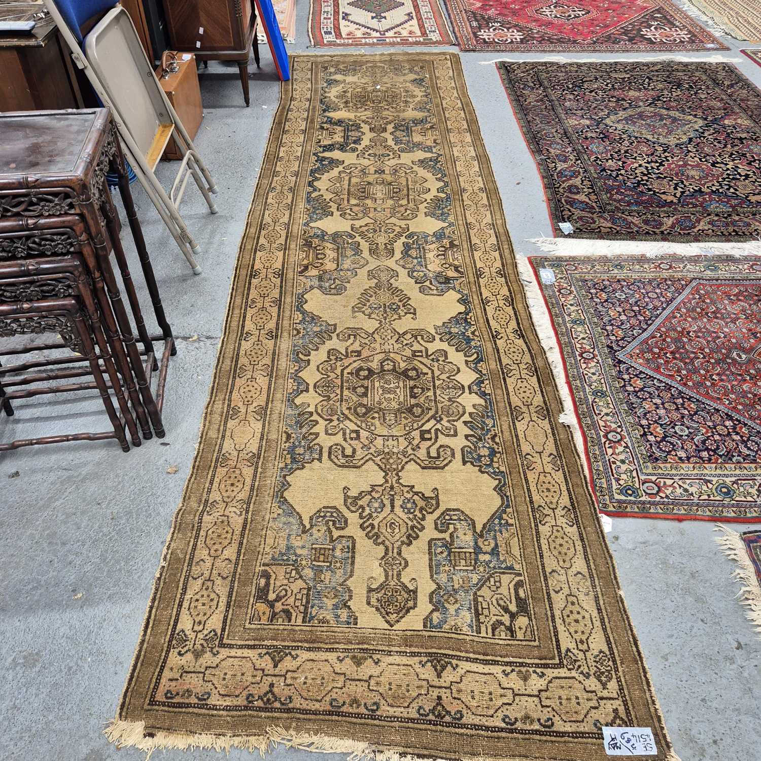 Lot 684 - An antique  Persian tribal runner