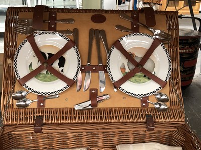 Lot 766 - A picnic basket fitted with four place settings