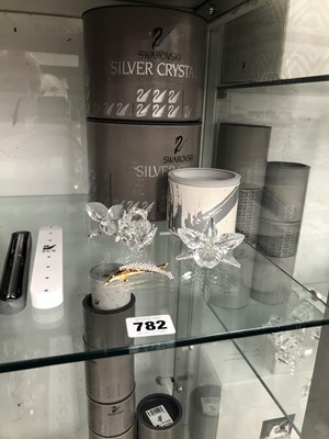 Lot 782 - Two boxed Swarovski glass flowers, a dolphin...