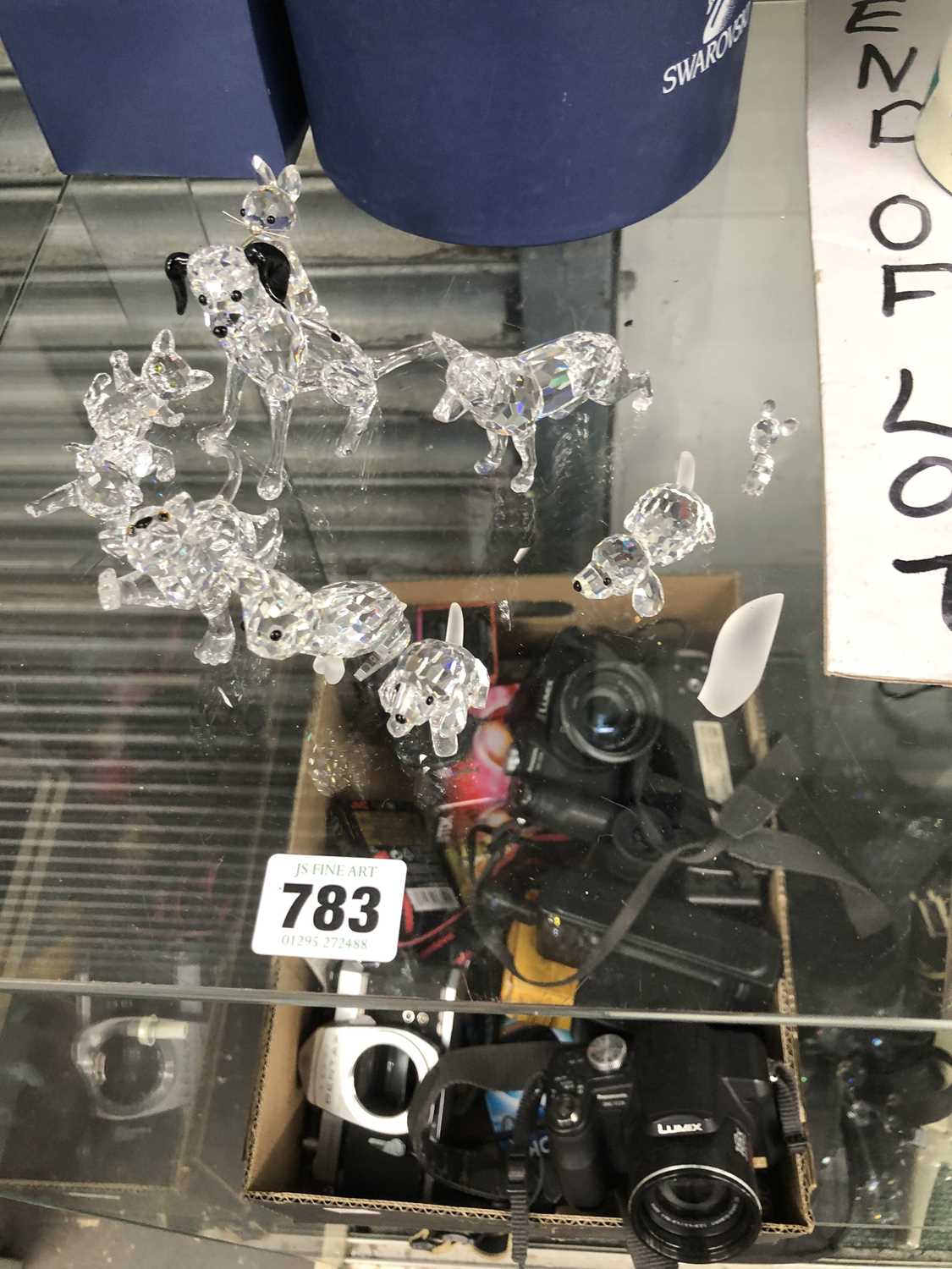 Lot 783 - Nine Swarovski glass animals, mainly boxed to...