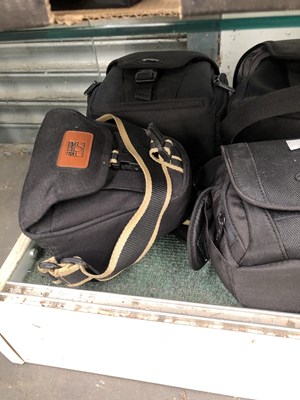Lot 786 - Lumix and Nikon cameras, lenses and cases with...