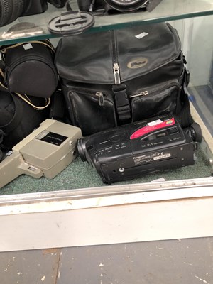 Lot 786 - Lumix and Nikon cameras, lenses and cases with...