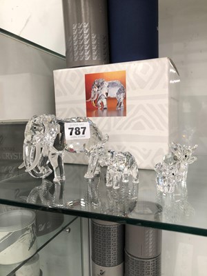 Lot 787 - Four Swarovski glass elephants with boxes