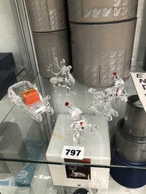 Lot 797 - Swarovski: a sledge, a stag, two child clowns...