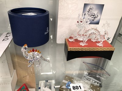 Lot 801 - A Swarovski dinosaur together with a Swarovski...