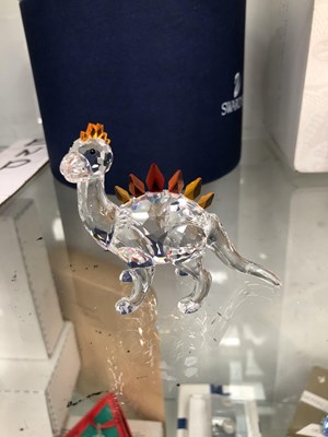 Lot 801 - A Swarovski dinosaur together with a Swarovski...