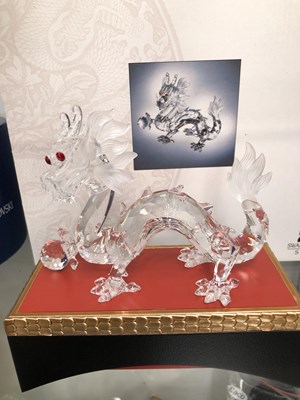 Lot 801 - A Swarovski dinosaur together with a Swarovski...