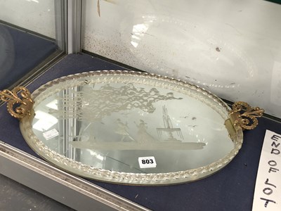 Lot 803 - A Venetian engraved mirrored glass oval tray...