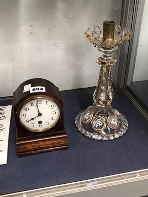Lot 804 - A Bohemian clear glass candlestick with white...