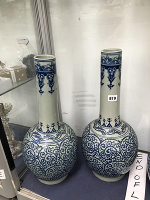 Lot 810 - A pair of Chinese blue and white bottle vases