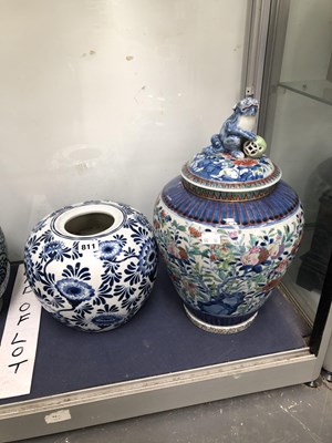 Lot 811 - A Japanese Imari covered jar together with a...