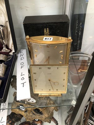 Lot 817 - A cased gilt metal mounted mantel clock...