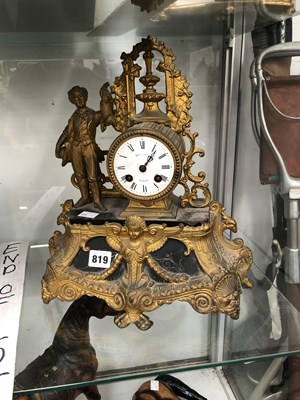 Lot 819 - A French gilt metal and black marble mantle...