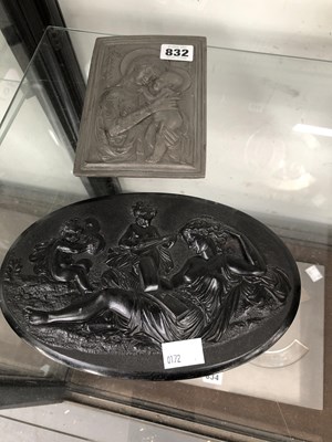 Lot 832 - A relief plaque of two musical putti and a...
