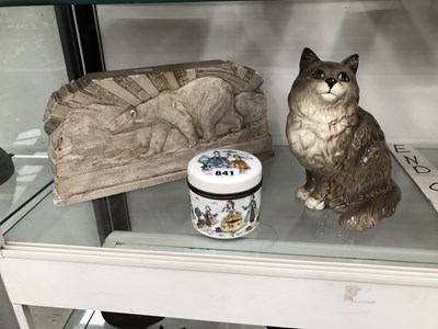 Lot 841 - A plaster plaque moulded with a polar bear, a...