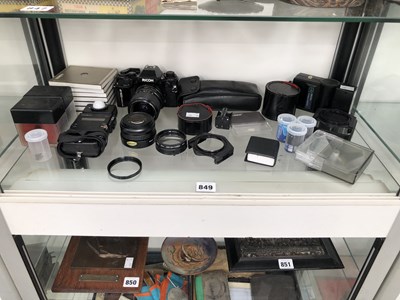 Lot 849 - A Ricoh camera, lenses, flash units, filters,...