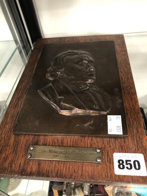 Lot 850 - An oak backed bronze relief plaque of William...