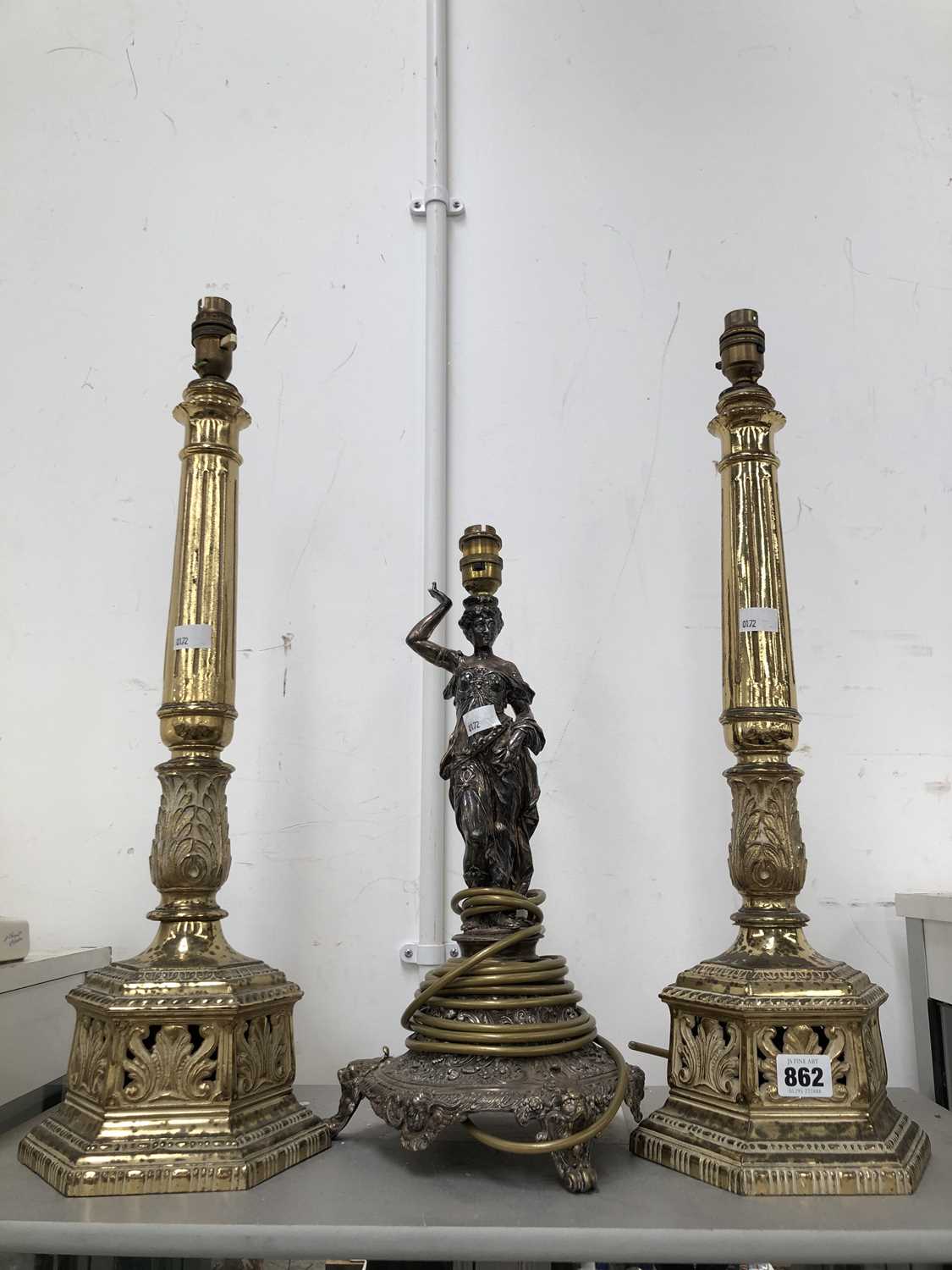 Lot 862 - A pair of brass column table lamps together...