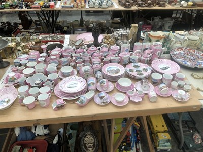 Lot 887 - A large collection of German porcelain pink...