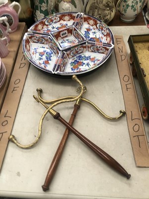 Lot 889 - Two brass coat hangers together with an Imari...