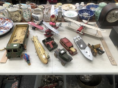Lot 890 - Tin plate toys: to include aircraft, the R100...