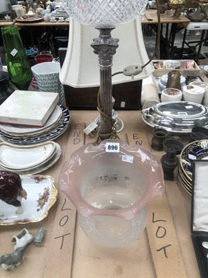 Lot 896 - An electroplate Corinthian column oil lamp...