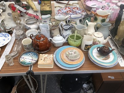 Lot 911 - Dickens commemorative and other jugs, tea pots,...