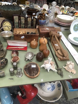 Lot 915 - A collection of brass bells, three clocks, a...