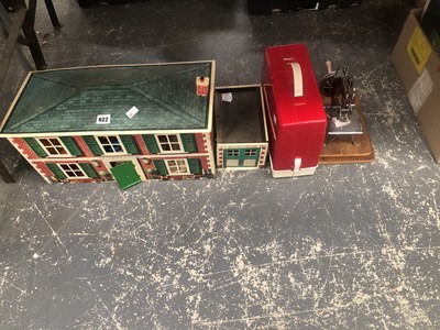 Lot 922 - A tin plate dolls house and garage together...