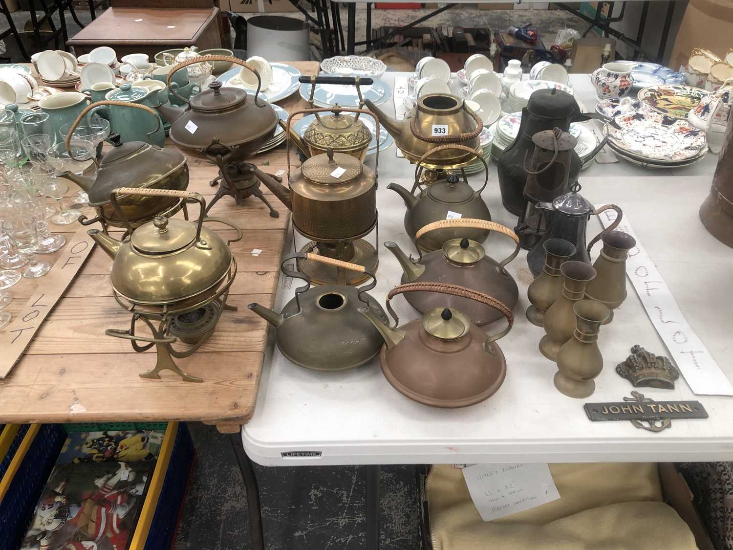 Lot 933 - A collection of brass and copper kettles some...