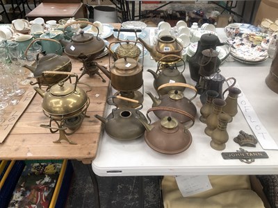 Lot 933 - A collection of brass and copper kettles some...