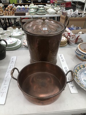 Lot 934 - An arts and Crafts copper two handled coal...