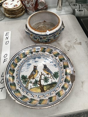 Lot 936 - A faenza dish painted with two birds together...