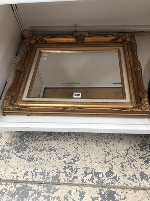 Lot 939 - A rectangular mirror in a gilt frame+++