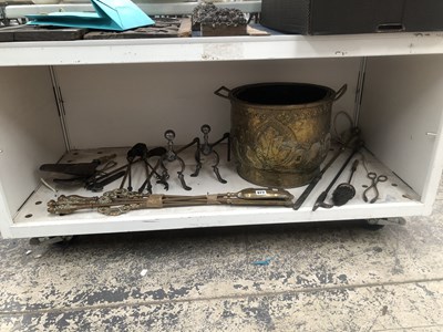 Lot 977 - A brass coal bucket together with fire irons...